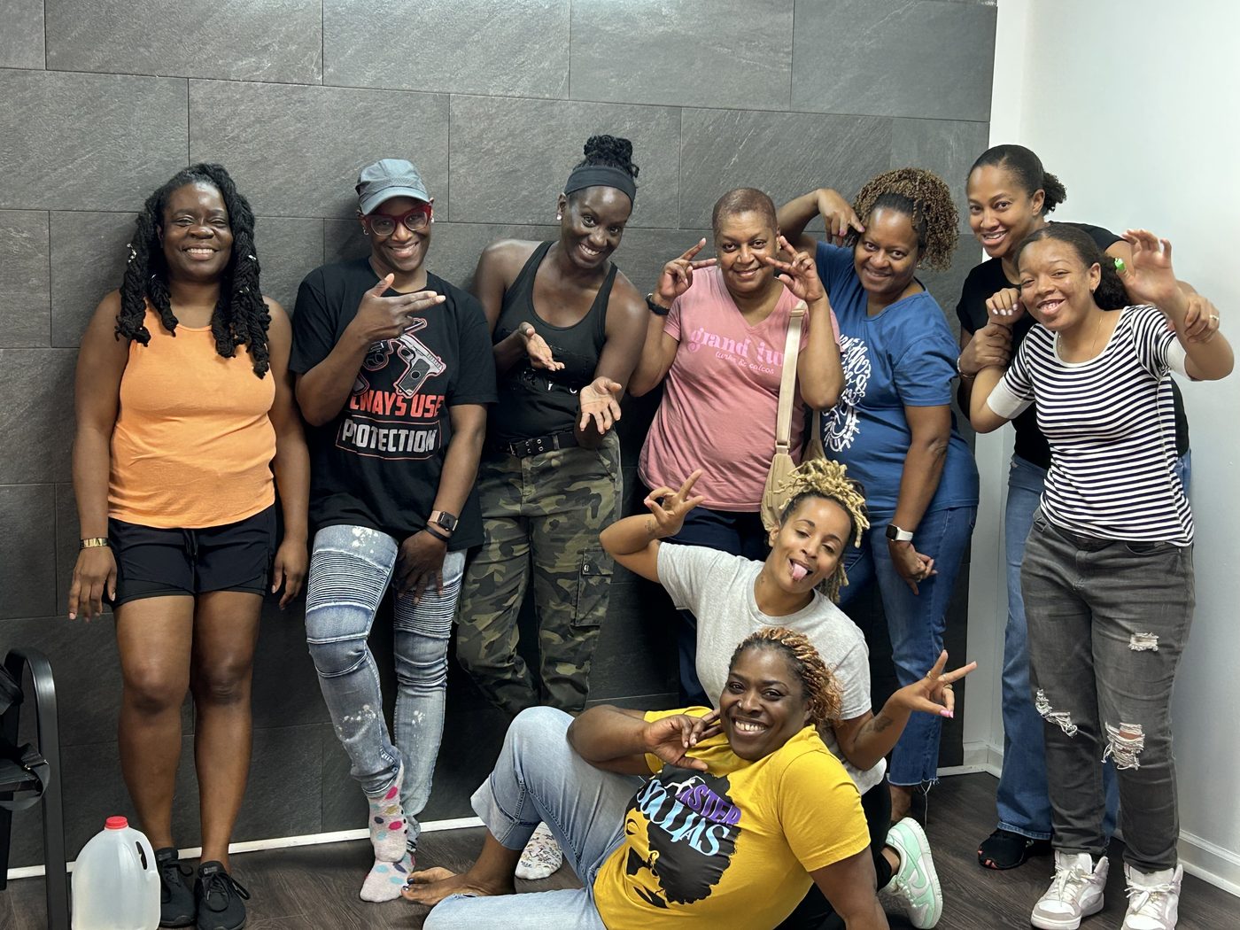 Full group photo of Crowned by Fire participants, smiling together